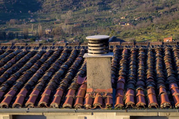 istock Old chimney pipe outlet on roof horizontally 1465567373