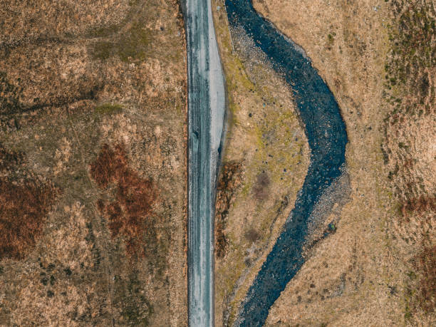 istock Ariel view of road parallel to river 1465567451