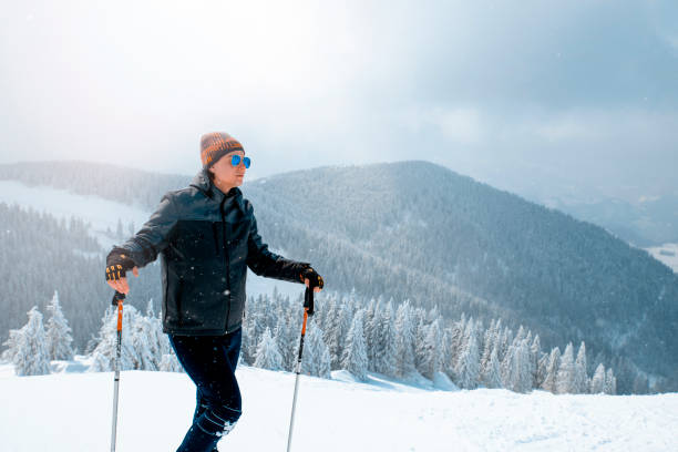 istock Man hiker Enjoying clean fresh air in mountains 1465567922