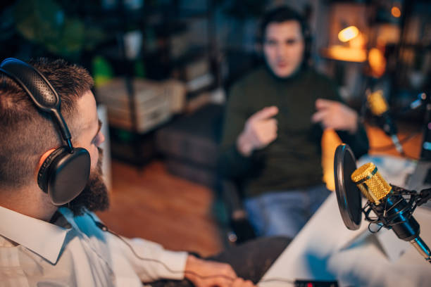 istock People in the podcast studio talking and recording 1465568000