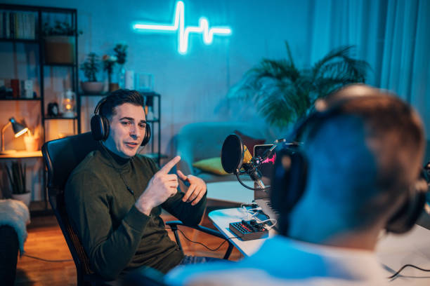 istock People in the podcast studio talking and recording 1465568438