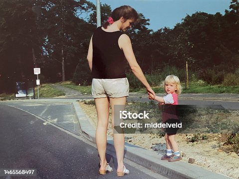 istock Walking with mother 1465568497