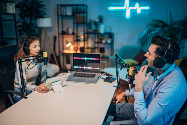 istock People in the podcast studio talking and recording 1465571659