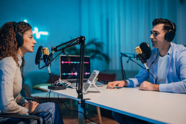 istock People in the podcast studio talking and recording 1465572691