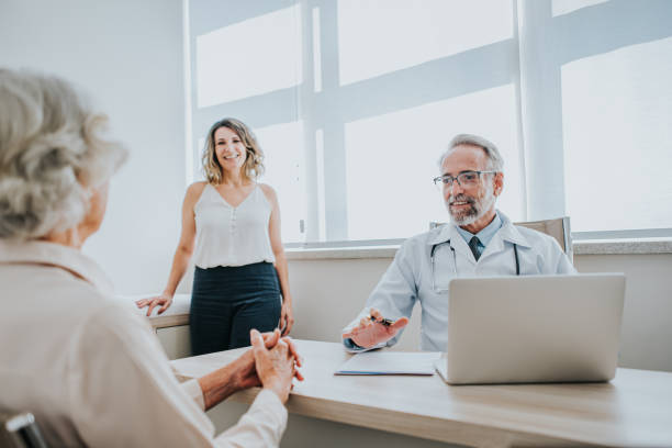 istock Taking the elderly mother to a doctor's appointment 1465572815