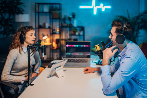 istock People in the podcast studio talking and recording 1465572833