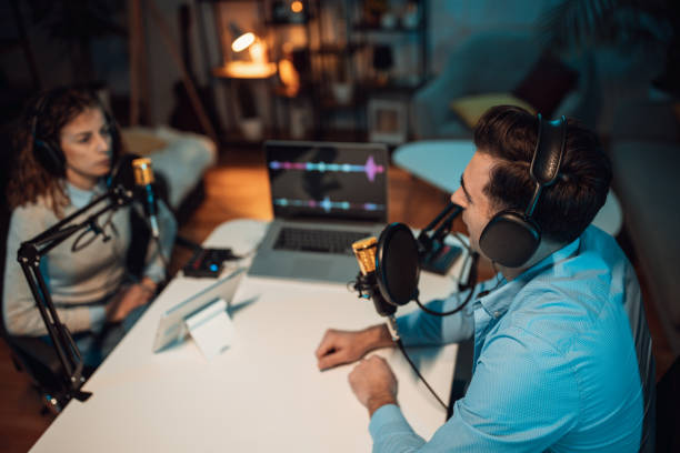 istock People in the podcast studio talking and recording 1465573148