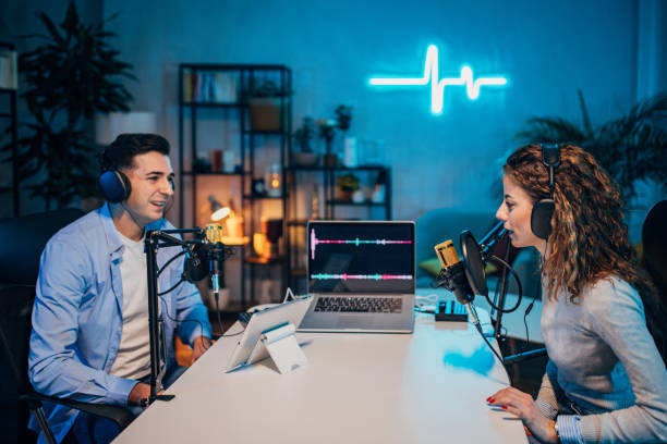 istock People in the podcast studio talking and recording 1465573441