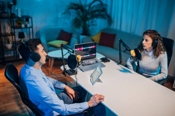istock People in the podcast studio talking and recording 1465574264