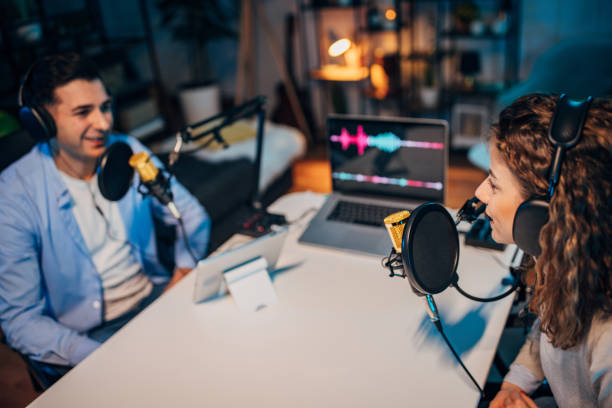 istock People in the podcast studio talking and recording 1465574947