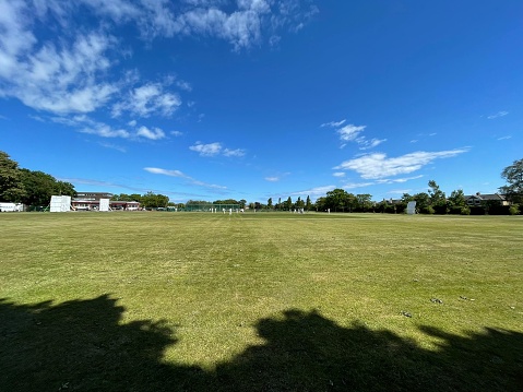 A cricket match in Ashington, Northumberland on a summer’s day.