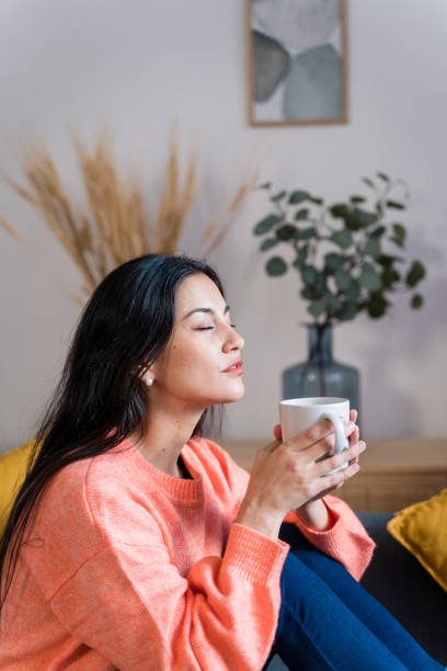 istock serious woman with cup of coffee 1465575457