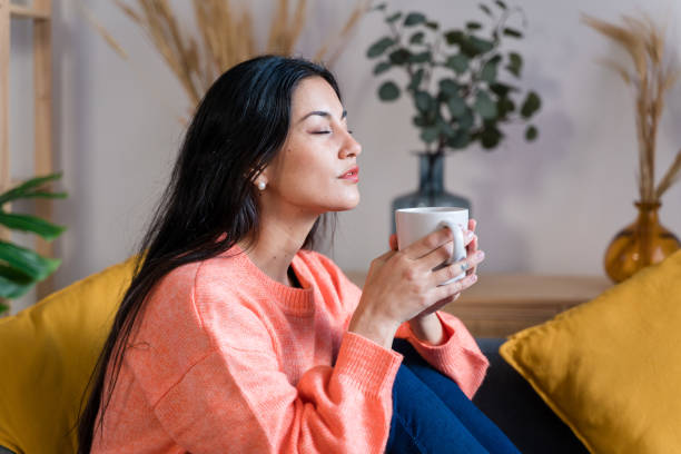 istock serious woman with cup of coffee 1465575688