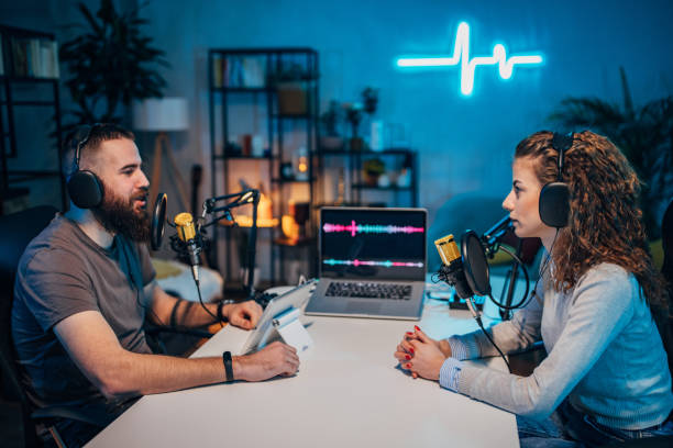 istock People in the podcast studio talking and recording 1465575889