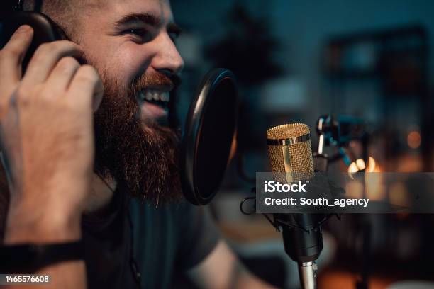 Young Man In The Podcast Studio Stock Photo - Download Image Now - Podcasting, Studio - Workplace, Radio Show