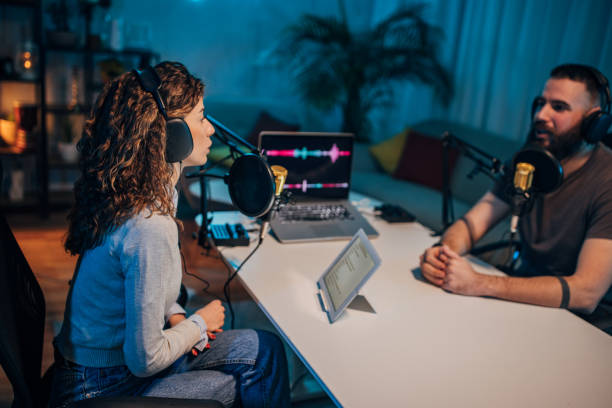istock People in the podcast studio talking and recording 1465577540