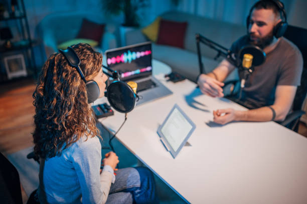 istock People in the podcast studio talking and recording 1465577622