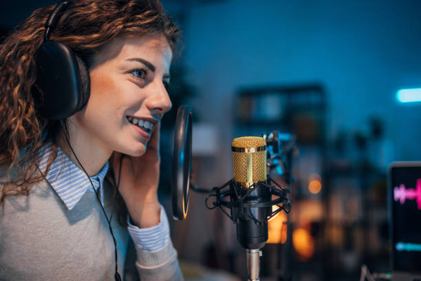 istock Young woman in the podcast studio 1465578494