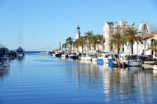 Photo of Le Grau du Roi. Lighthouse and waterway. South of France. Europe. Tourism II.