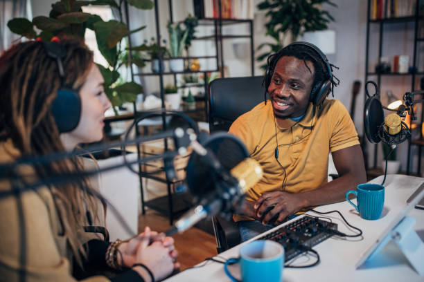 istock People in the podcast studio talking and recording 1465580559