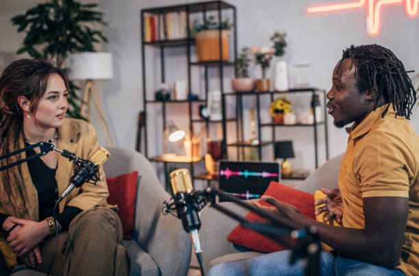istock People in the podcast studio talking and recording 1465582225