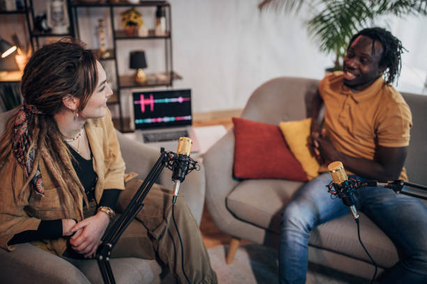 istock People in the podcast studio talking and recording 1465582355