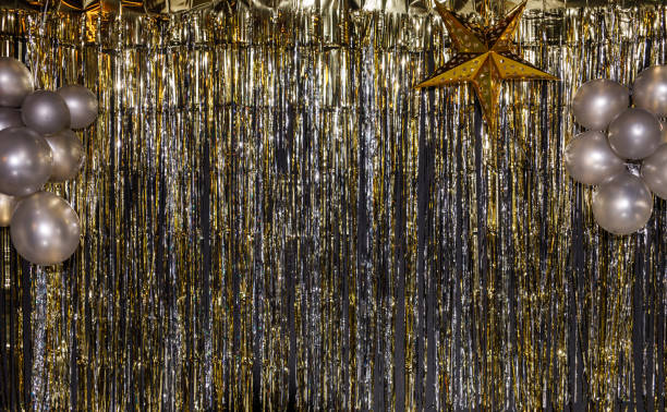 istock Sparkly tinsel curtain backdrop for New Year's eve party celebration 1465582638