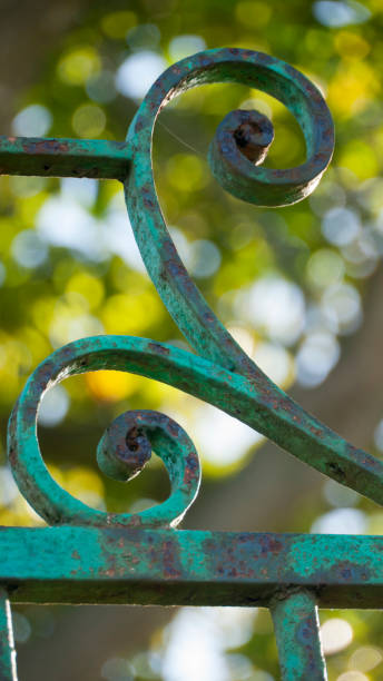 istock Espiral  shapes in old metallic fence 1465582658