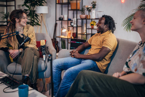 istock Three people in the podcast studio talking and recording 1465582799