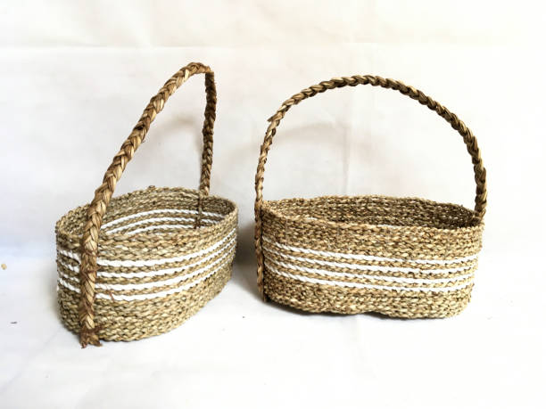istock Basket weaving with handle made from Pandanus odorifer or fragrant screw-pine on a white background for product photography 1465582836