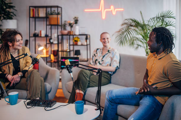 istock Three people in the podcast studio talking and recording 1465583025