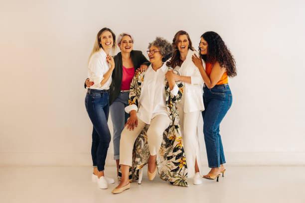 istock Successful female entrepreneurs laughing happily in a modern office 1465583719