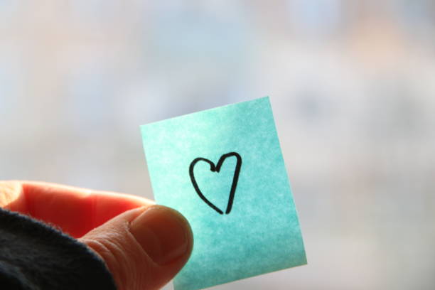 istock Heart on a paper tag. Birthday background. 1465585049