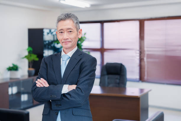 istock Executive management with arms crossed in the boardroom 1465586326