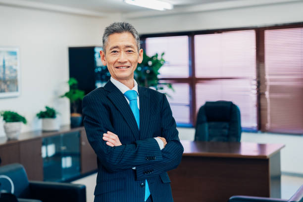 istock Executive management with arms crossed in the boardroom 1465586333