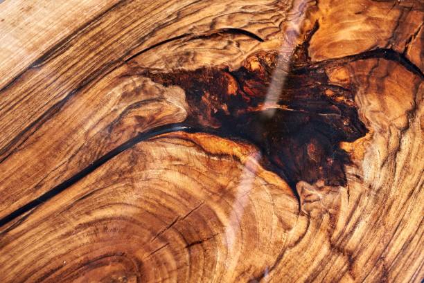 istock Texture of a wooden table with epoxy resin. 1465587560