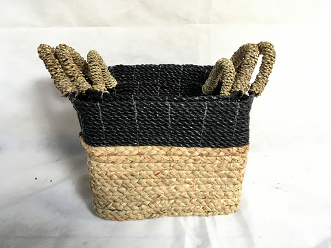 Multicolored Square Basket weaving with handle made from Pandanus odorifer or fragrant screw-pine on a white background for product photography