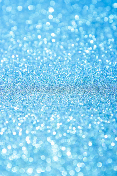 istock Blue trendy backdrop. Sparkling background made of lights. Festive blurred backdrop 1465591996