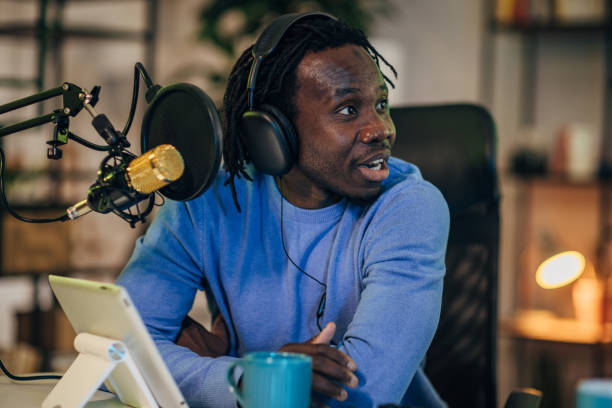 istock People in the podcast studio talking and recording 1465592056