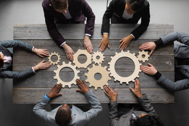 istock Business people connect gear 1465593766