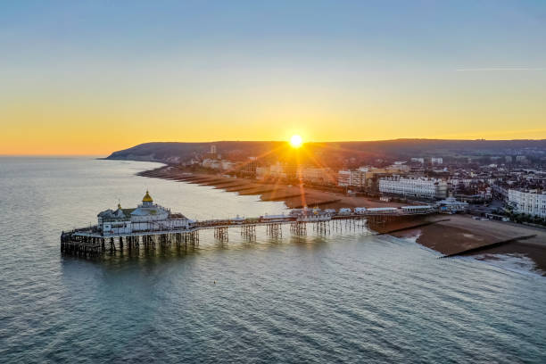 Eastbourne East Sussex England Europe Aerial view of Eastbourne sunset famous Eastbourne pier English Channel East Sussex England Europe eastbourne pier photos stock pictures, royalty-free photos & images