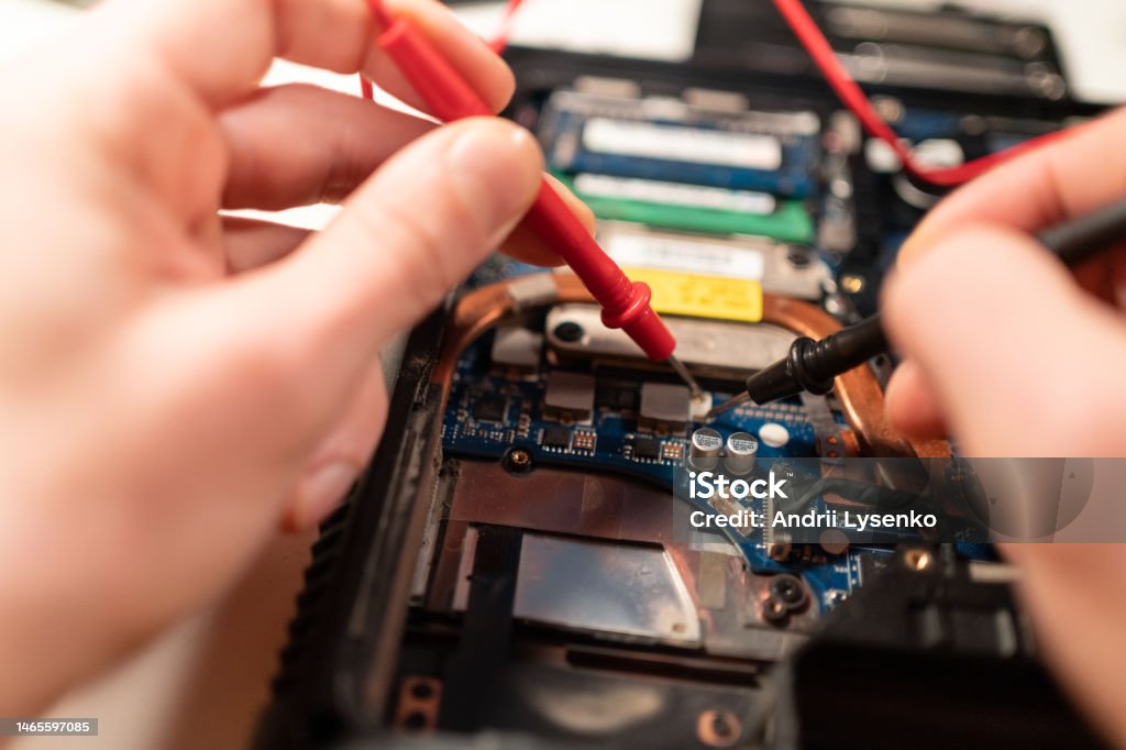 Contantly Checking Computer Technical Check Problem For Laptop Computer With Multimeter Close Up ...