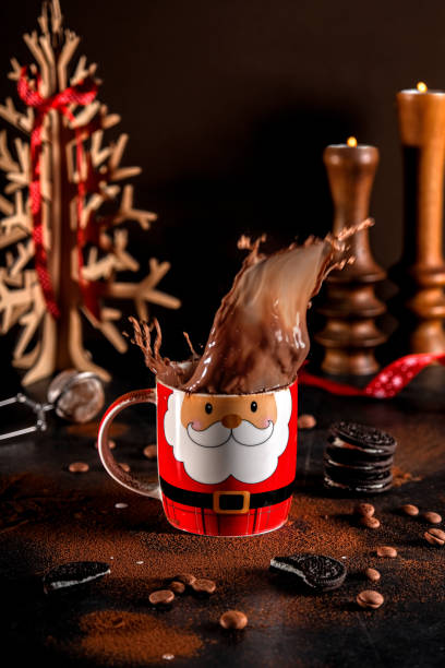 Hot chocolate in red Santa Claus mug. stock photo