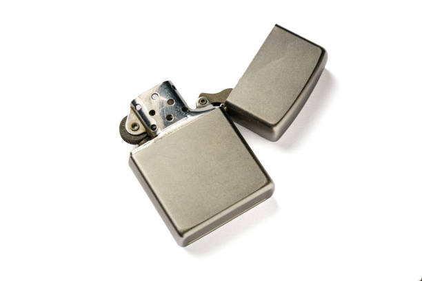 istock Metal gasoline lighter with an open lid on a white background 1465600192