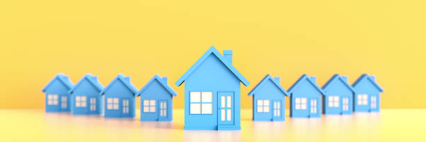 Blue house on yellow background. Hunting and searching concept stock photo