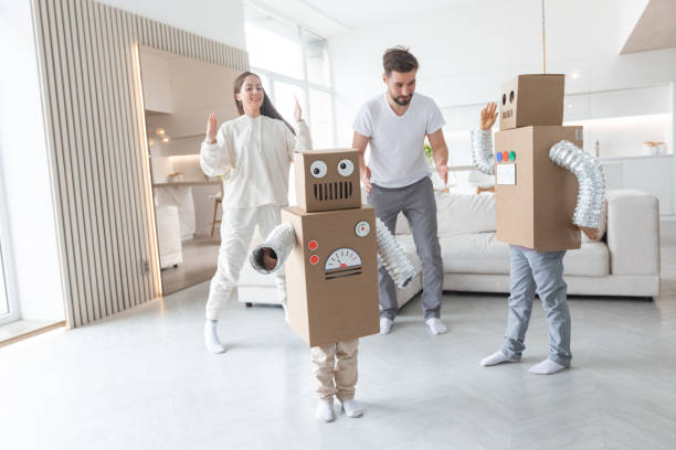 istock Family playing robots at home 1465603340