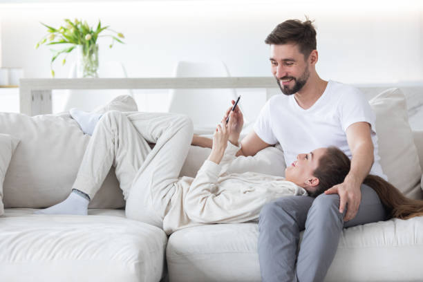 istock Happy couple enjoying at home 1465603346