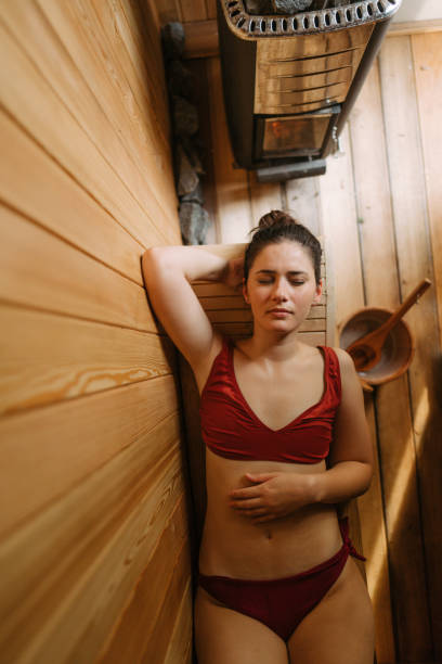 istock Woman enjoying the sauna 1465605598