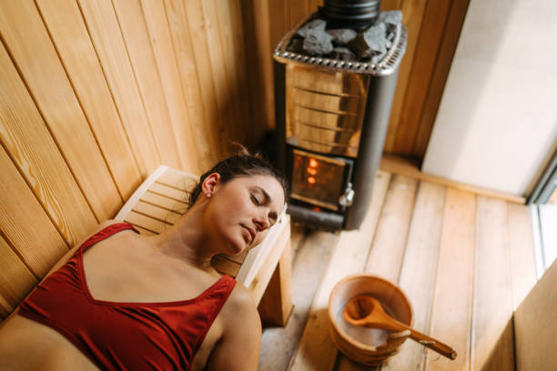 istock Woman enjoying the sauna 1465605601