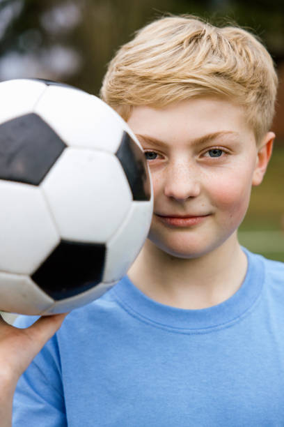 istock Boy Soccer Player Portrait 1465608221